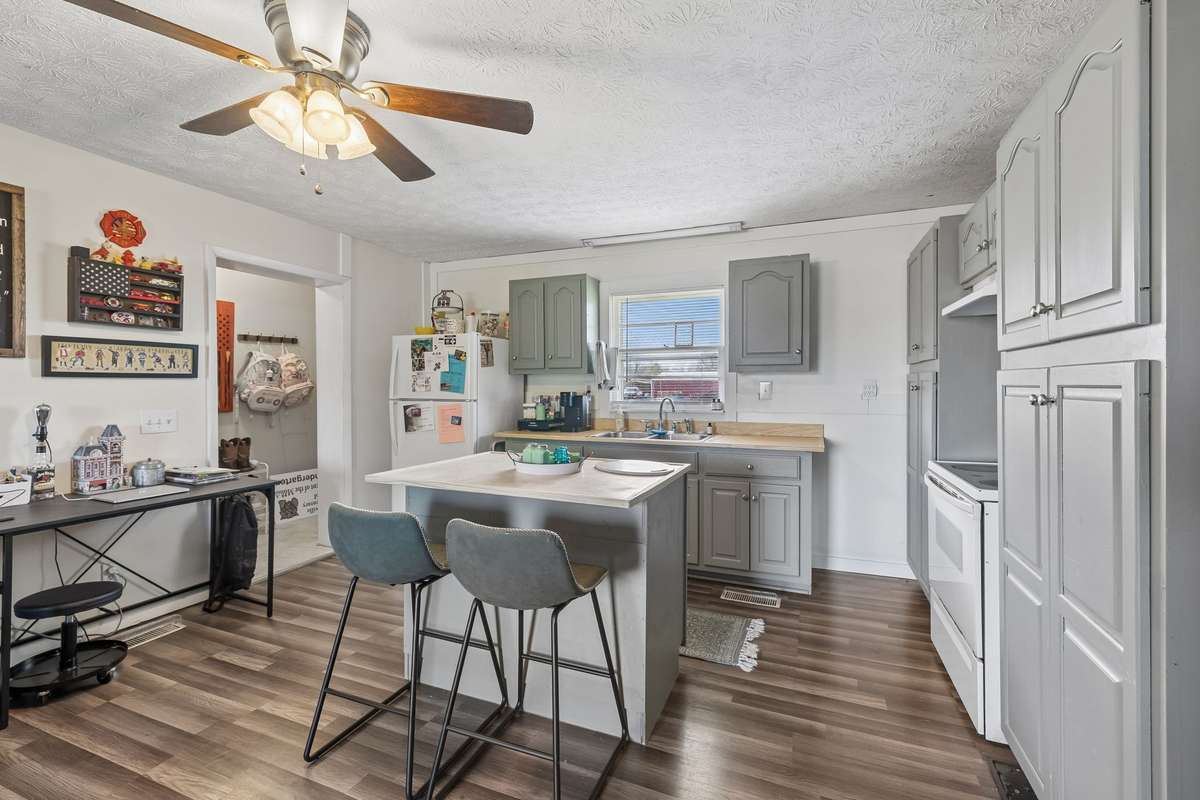 Kitchen has an abundance of cabinetry! 380 Holiday Haven Rd, Smithville, TN 37166