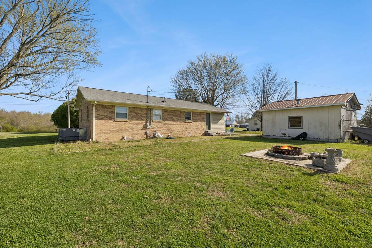 Large yard is over a half acre! 380 Holiday Haven Rd, Smithville, TN 37166