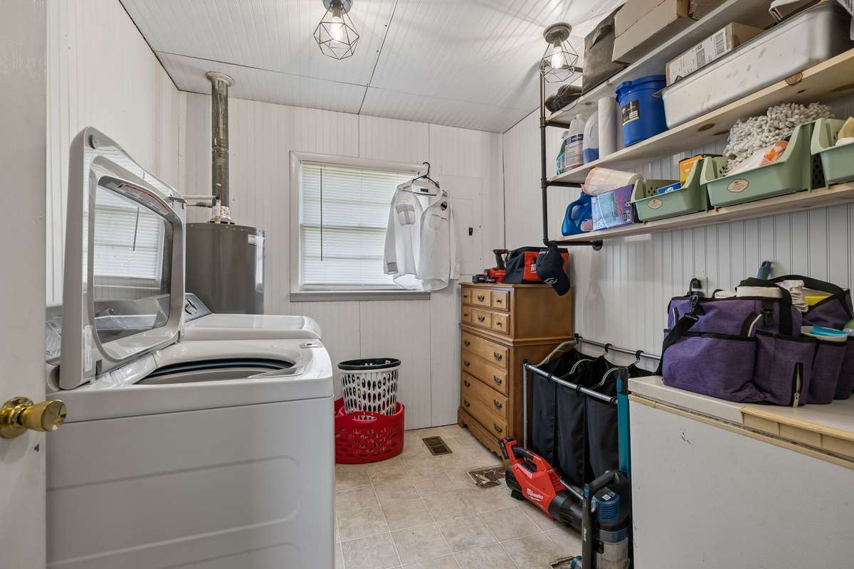 Large laundry room with space for extra storage! 380 Holiday Haven Rd, Smithville, TN 37166