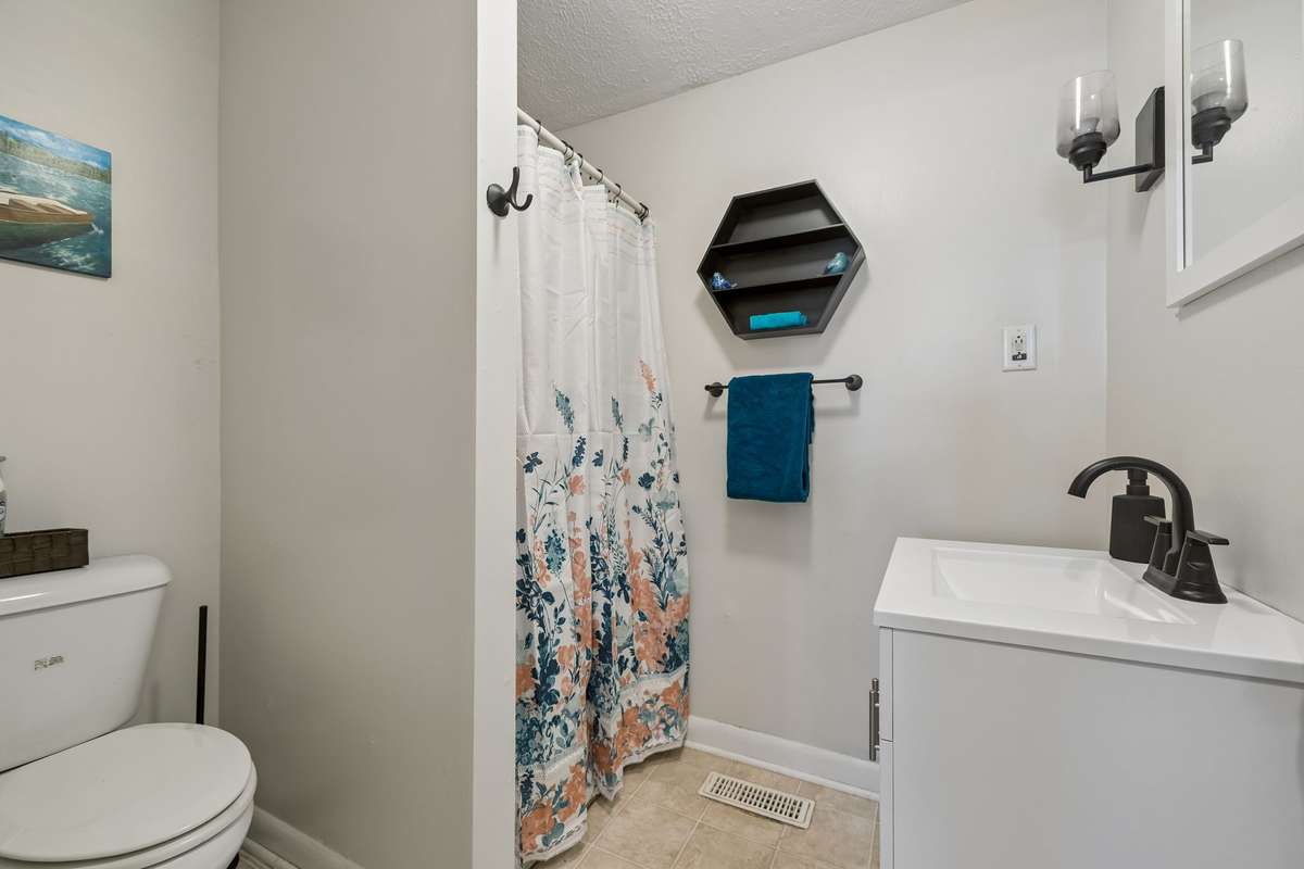 Freshly painted bath with roomy shower! 380 Holiday Haven Rd, Smithville, TN 37166