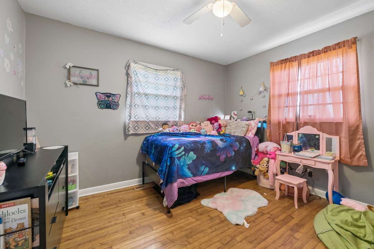 Bedroom three with hardwood flooring and ceiling fan! 380 Holiday Haven Rd, Smithville, TN 37166