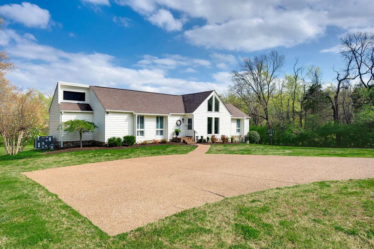 Charming exterior set on 2 private acres