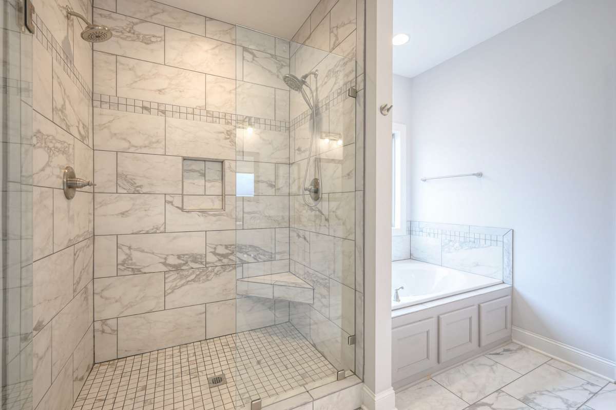 Gorgeous walk-in shower and separate tub for plenty of luxury and relaxing.