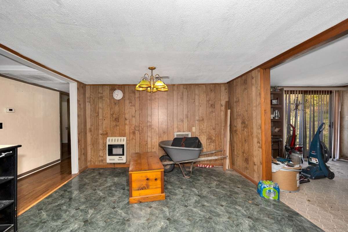Eat-In Kitchen- vinyl flooring, crown molding
