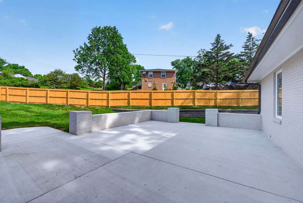 Fully fenced backyard — plenty of room for kids and pets to play.