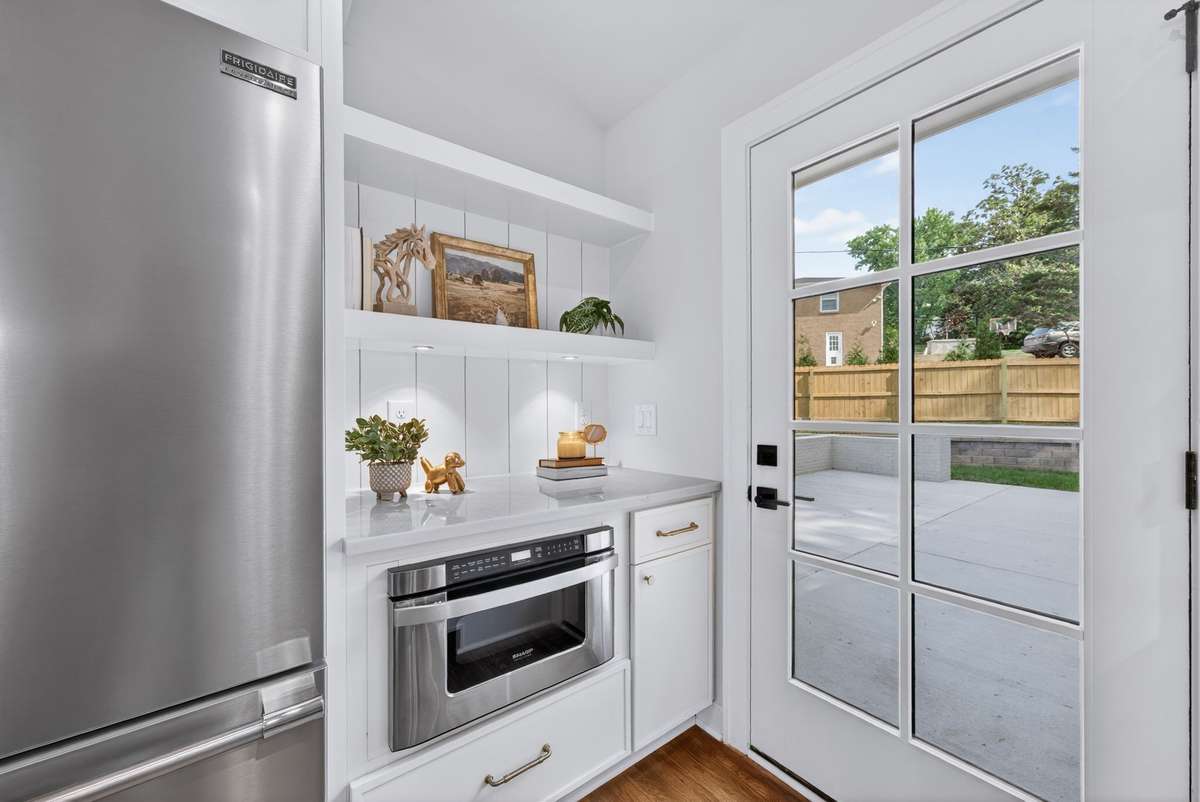Right off the kitchen, enjoy easy access to the outdoor kitchen and patio.