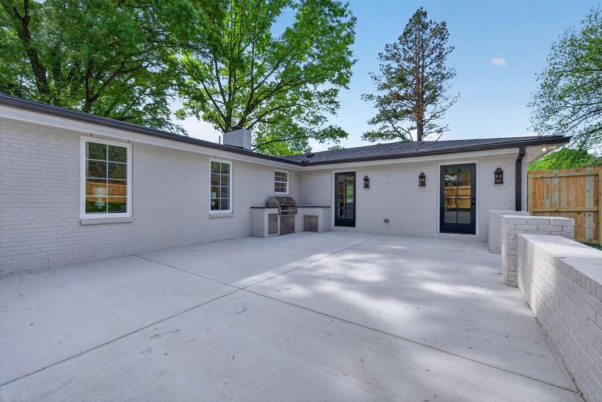 Imagine all the dinner parties out on your patio with the built-in outdoor kitchen and grill!