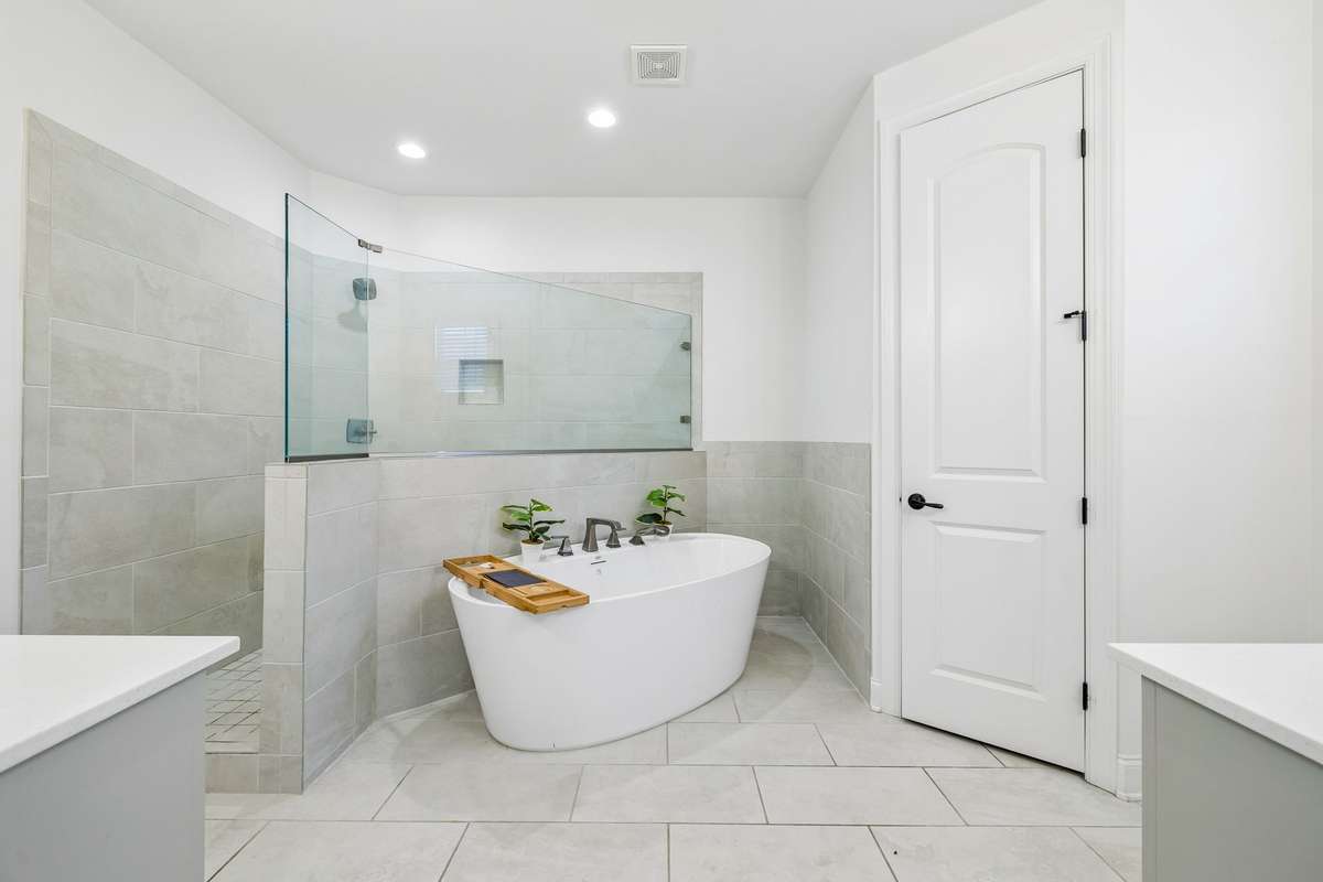 Primary Bathroom, separate vanities.
