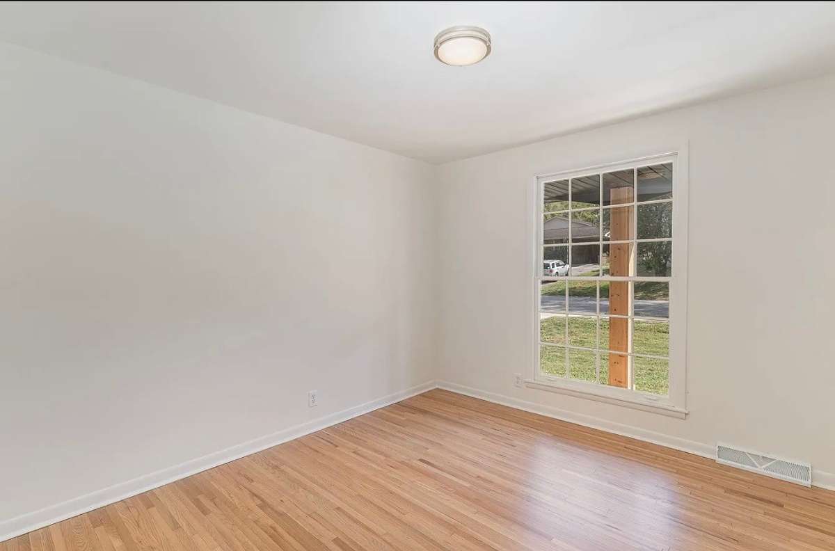 Bedroom upper level to the front street.