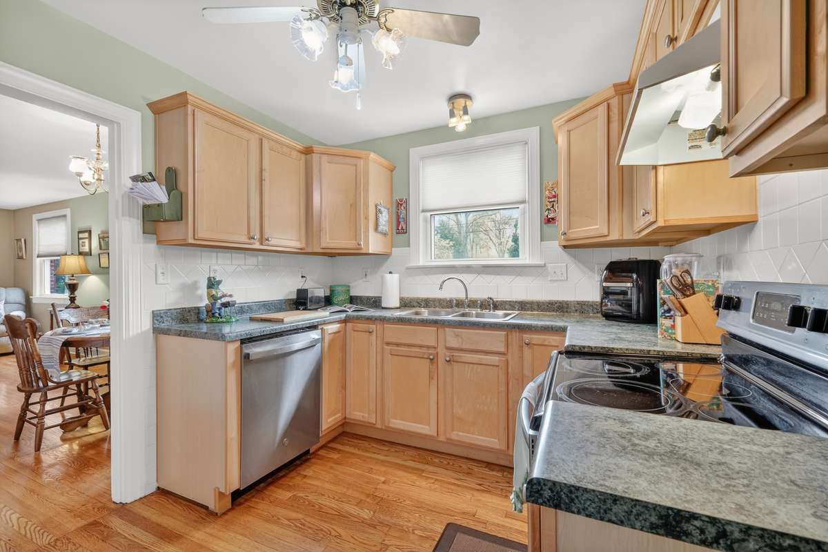 Updated kitchen cabinets, new dishwasher and nice counter space.
