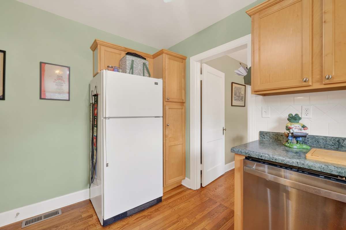 Space for your refrigerator and a pantry cabinet!  (Refrigerator does not remain)