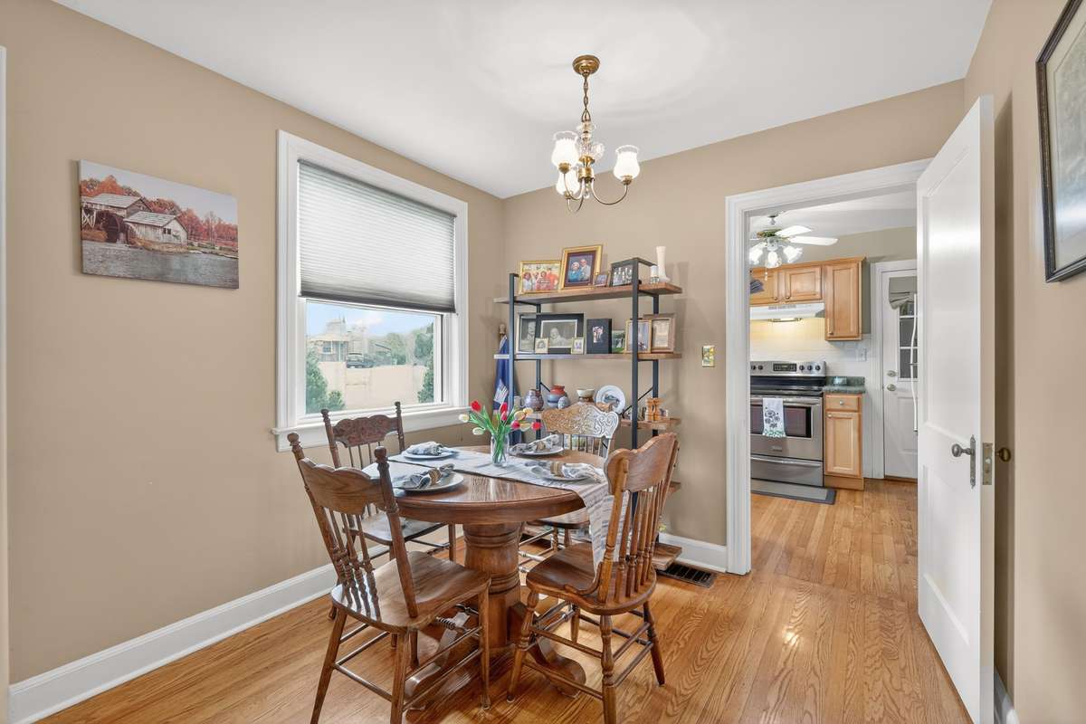Note the original wood doors with brass hardware!