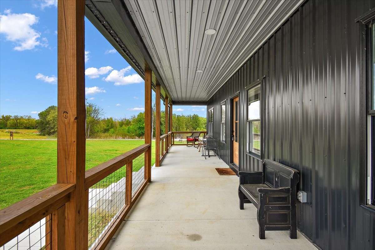This is a great porch to sit out and enjoy the weather and the view.
