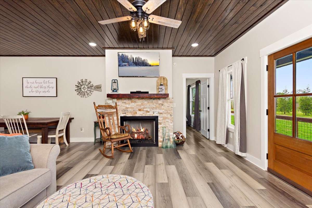 This is a view of our cozy Living Room and you can see a portion of our Dining Room.