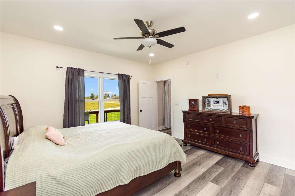 Another View of the Master Bedroom with a large window to see the view of the countryside.