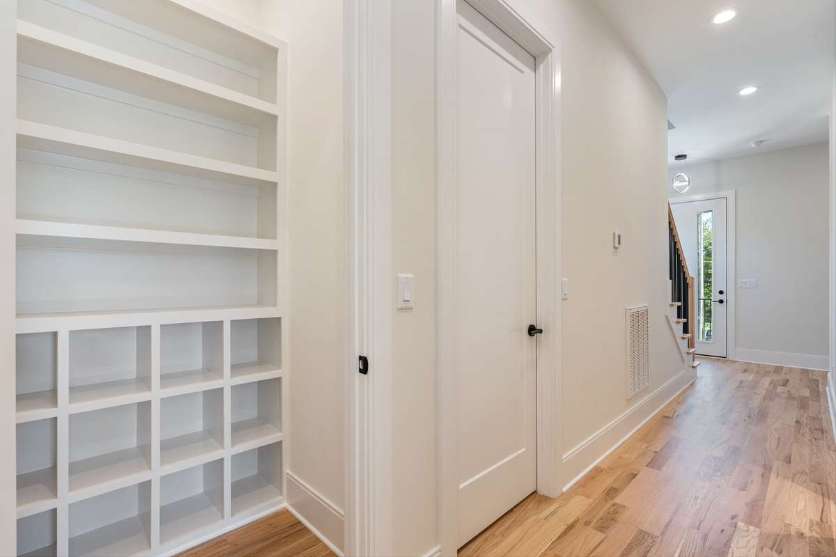 shoe/hat closet, next to coat closet.