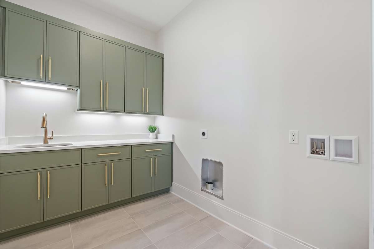 Main Laundry - 1 of 3 laundries in this home.