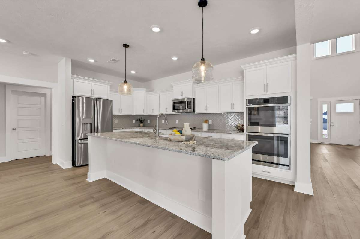 Chef's Kitchen with Upgraded appliances and a French door refrigerator