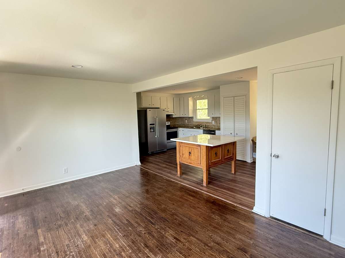 Living room looking into kitchen