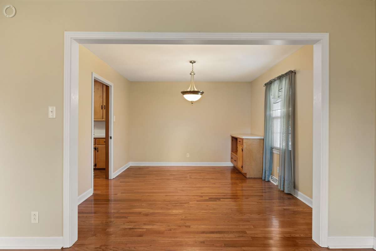 View of Formal Dinning Room with lots of light