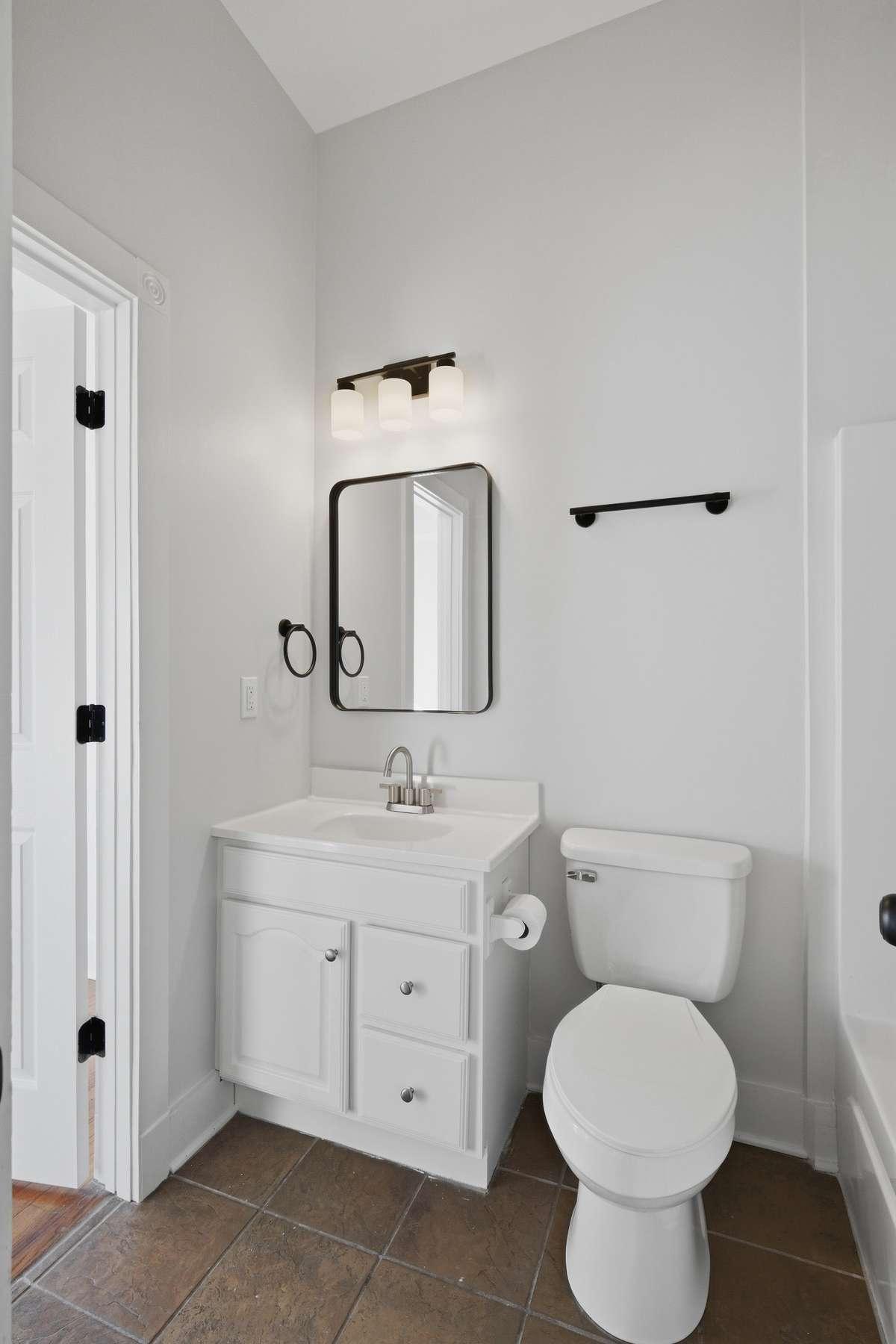 The full bath on the second floor (tub/shower combo out of frame to right), which has access from both the primary bedroom and the hallway.