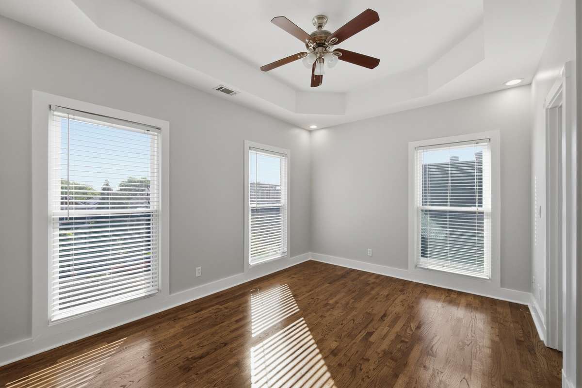 The primary bedroom on the second floor. Big windows, great natural light, and plenty of room for your king bed and furniture. Also notice the 9 foot ceilings on the second floor as well.