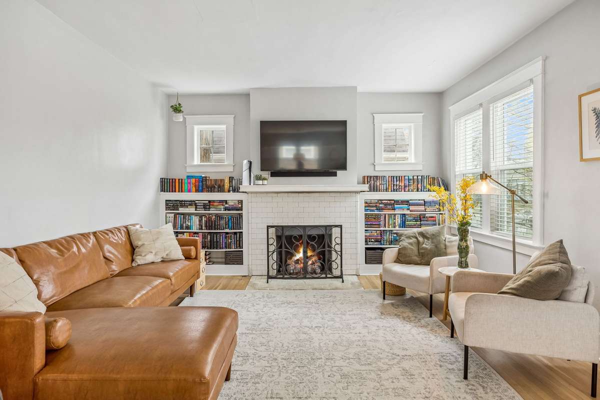 Living Room has custom bookcases and Gas fireplace