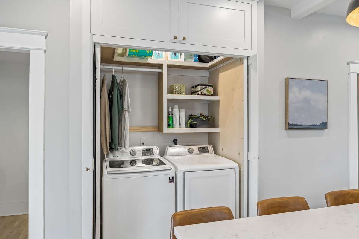 Laundry on the main has slide away doors for easy access