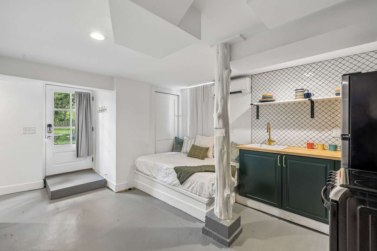 Bonus area with kitchen and built-in daybed