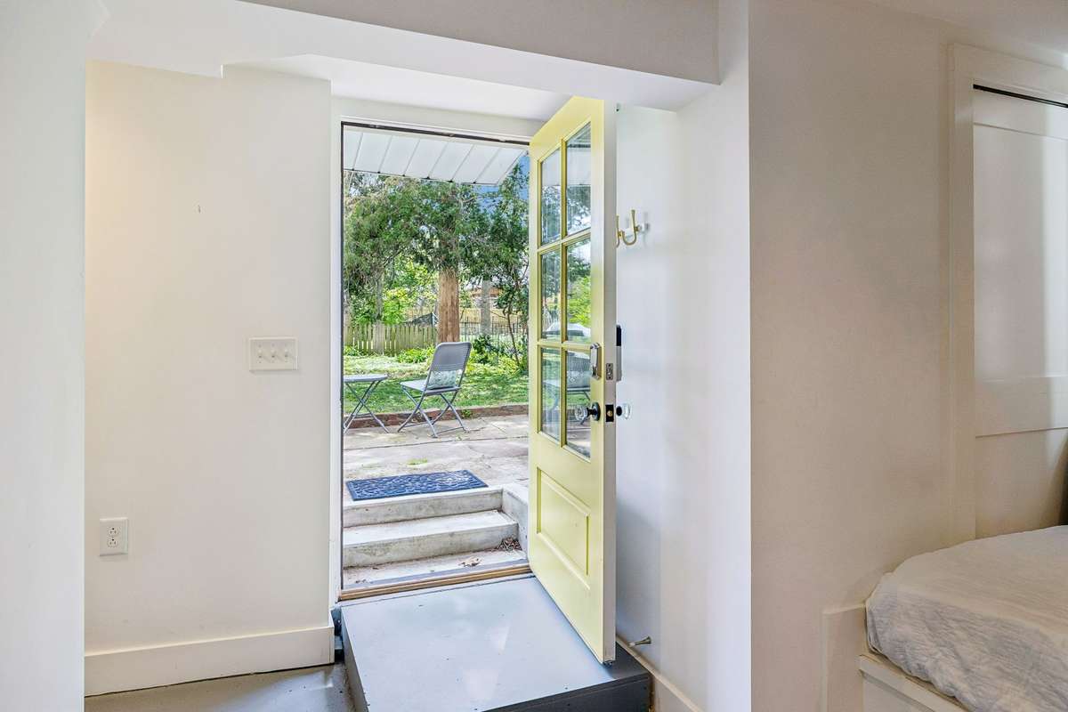 Basement exit leads to large yard
