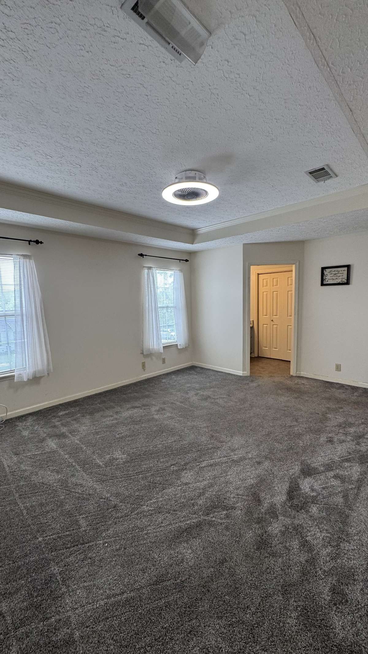 Master bedroom is large and ready for your furnture