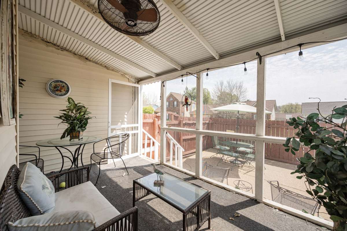 Screen porch on rear with patio and fenced yard