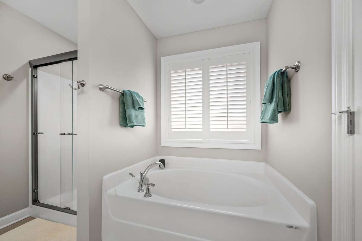 Separate shower and tub in Primary Bath.