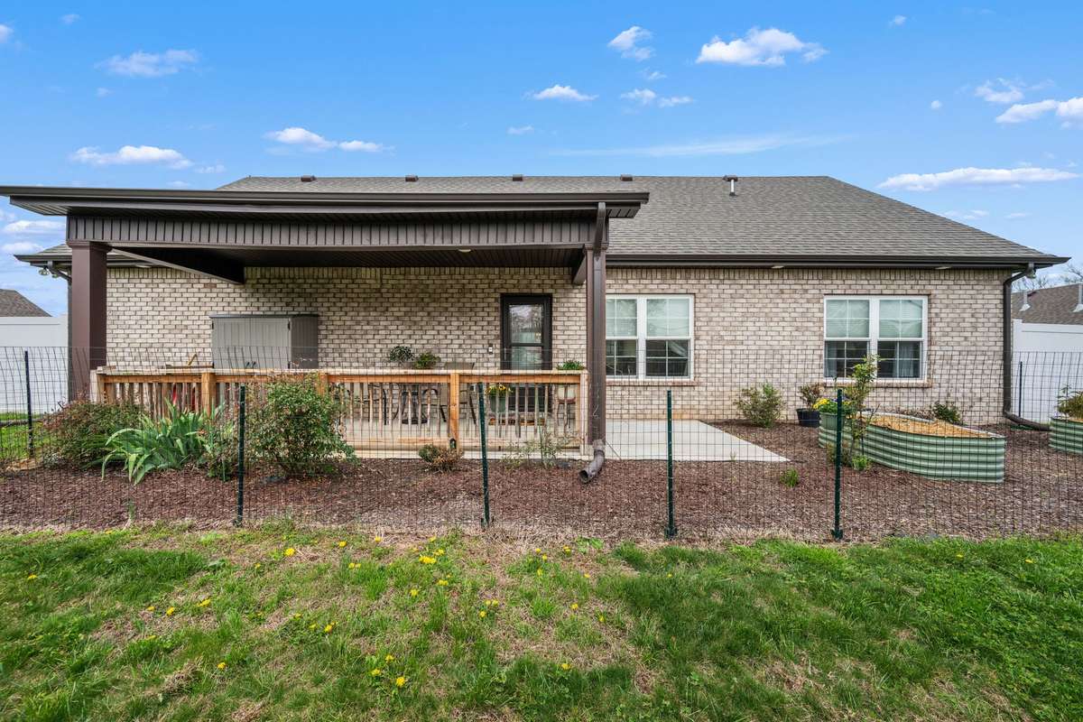 Back of house showing large covered patio.