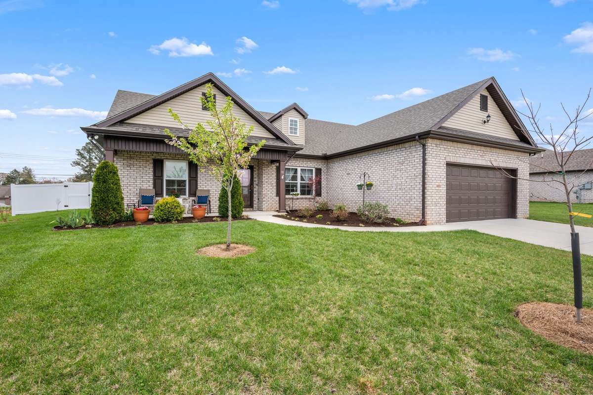 Well maintained home with beautiful landscaping.