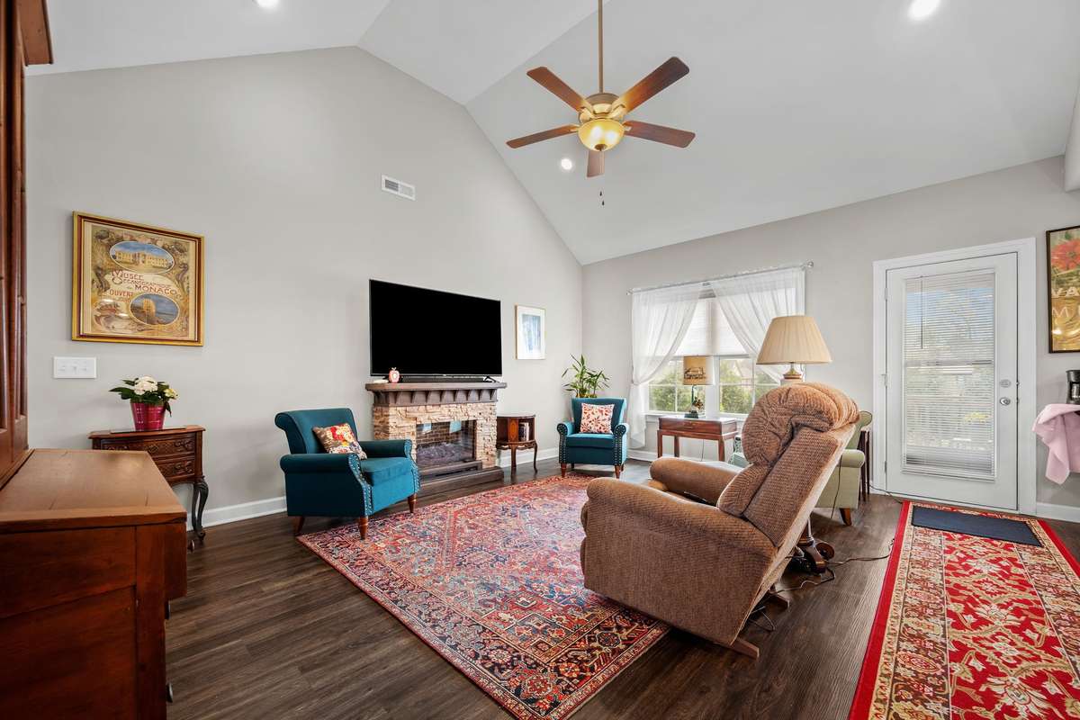 Living Room has an electric fireplace.