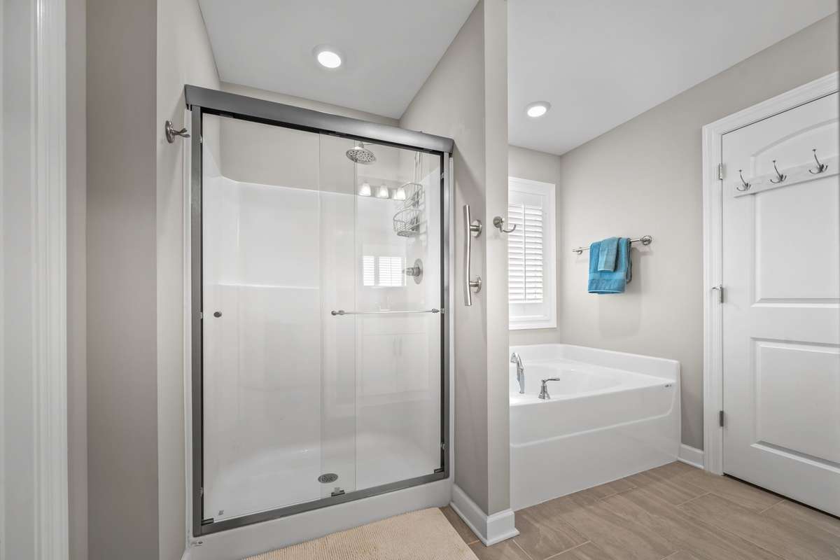 Tiled flooring in Primary Bath