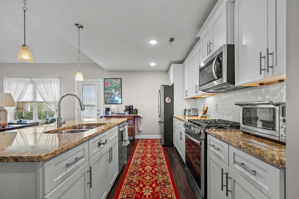 Kitchen has gas stove.
