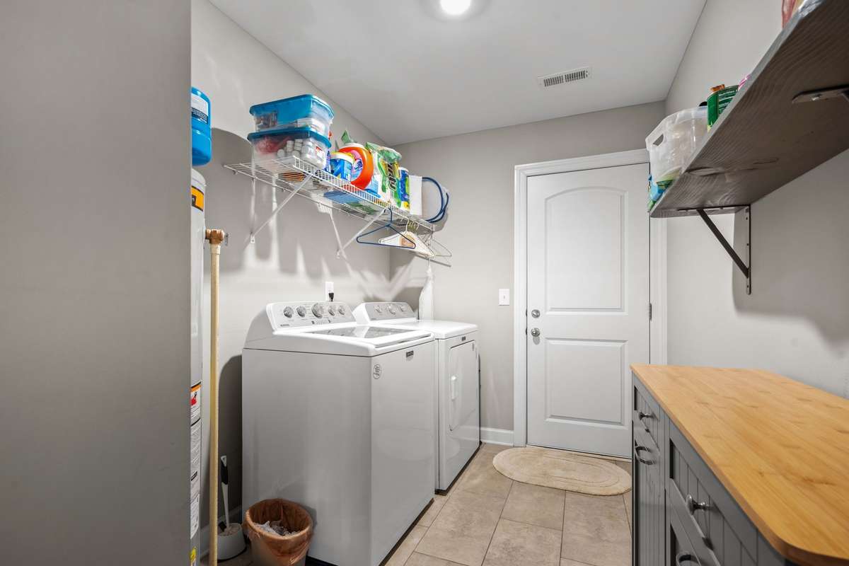 Utility Room has tiled flooring.