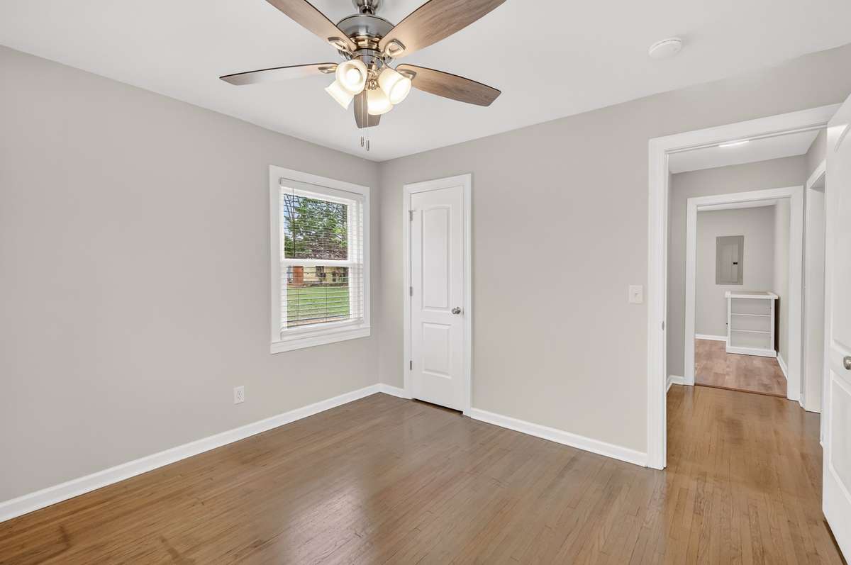 Second bedroom looking out toward kitchen.