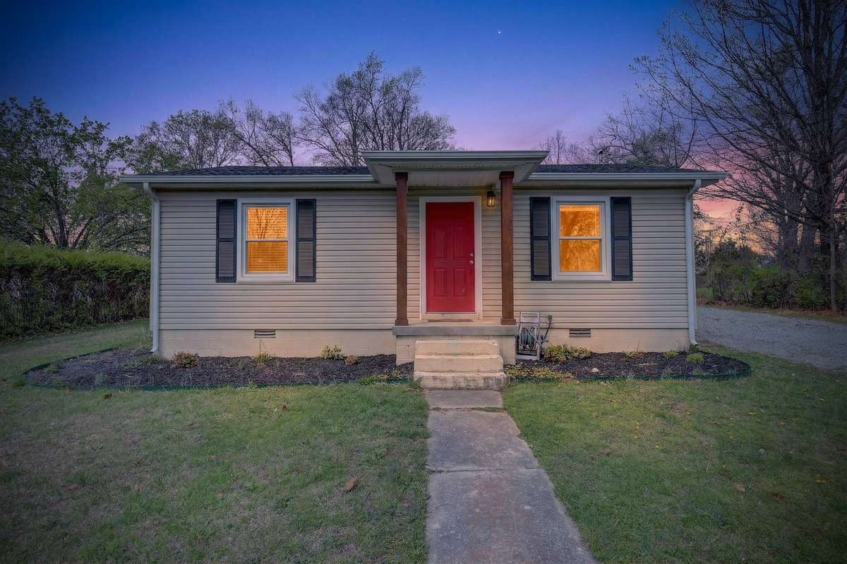 Another view of front of home as night comes