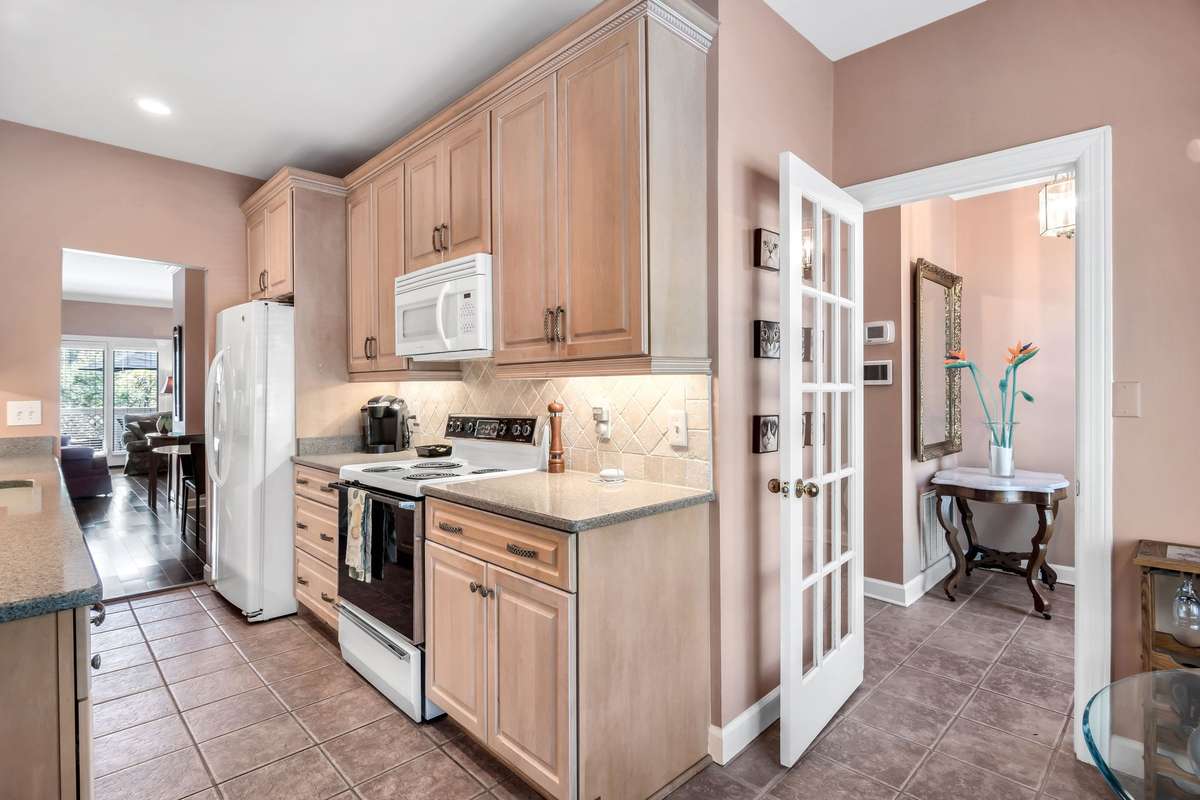 Updated custom cabinetry for full use of the ceiling height!