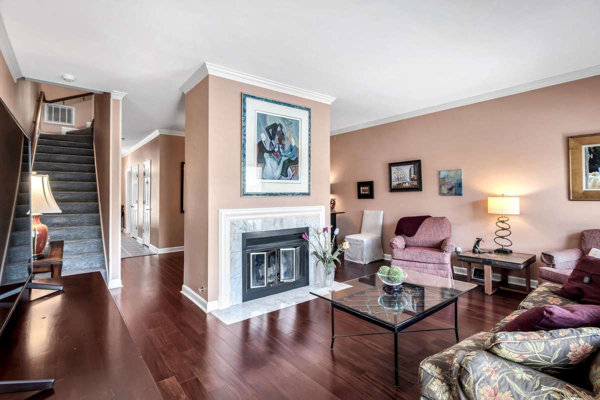 Gas fireplace separates the dining room & main living area.