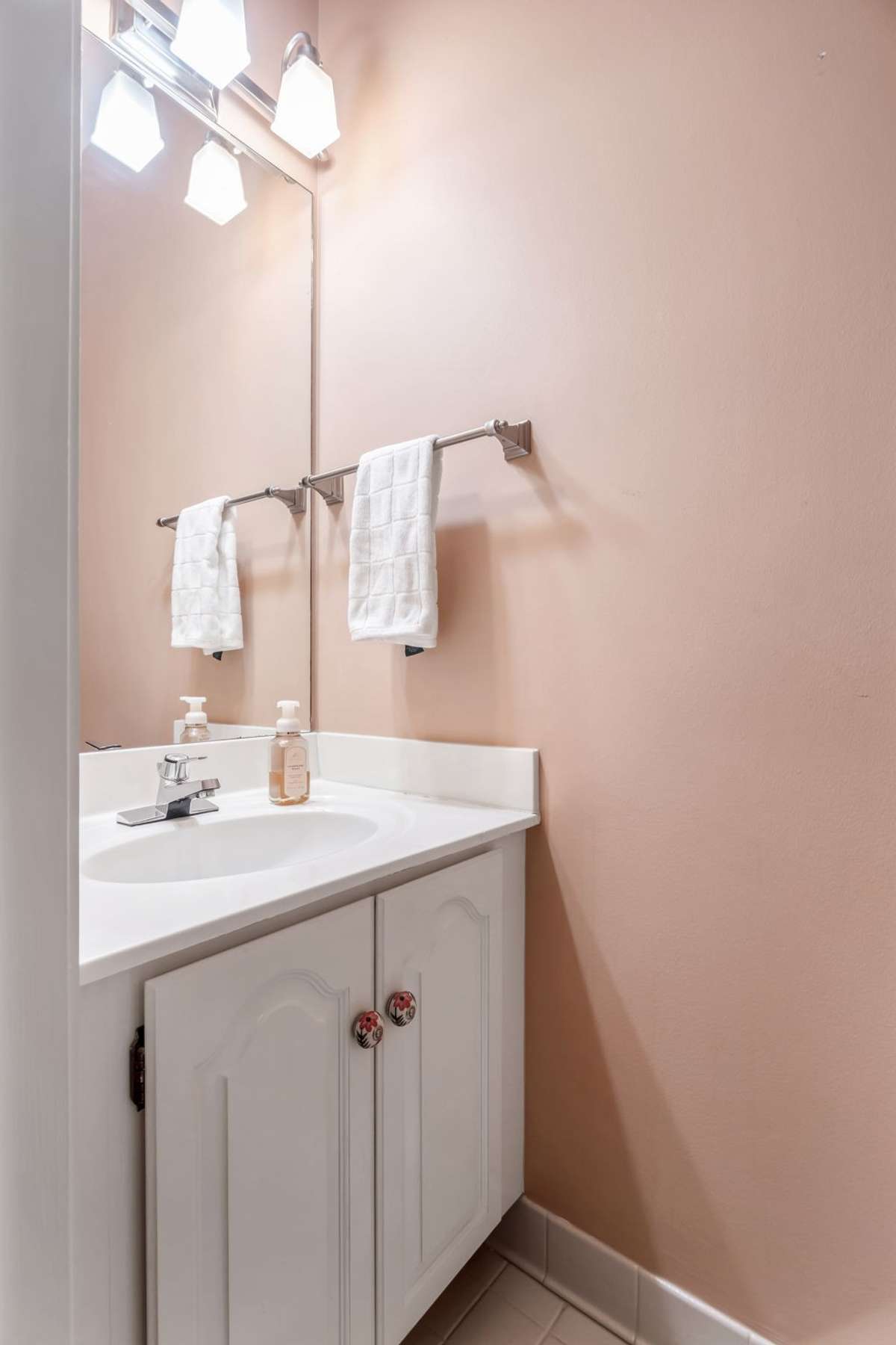 Half bath in entry hallway.