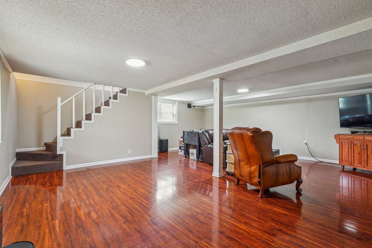 The finished basement is spacious and could accommodate a rec room, office, or hobby room.