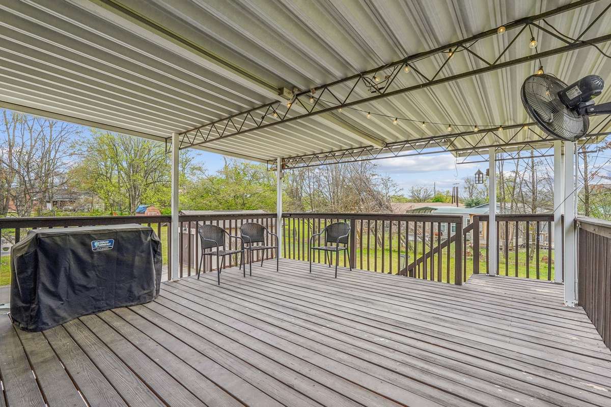 Enjoy entertaining on this covered deck even in the rain.