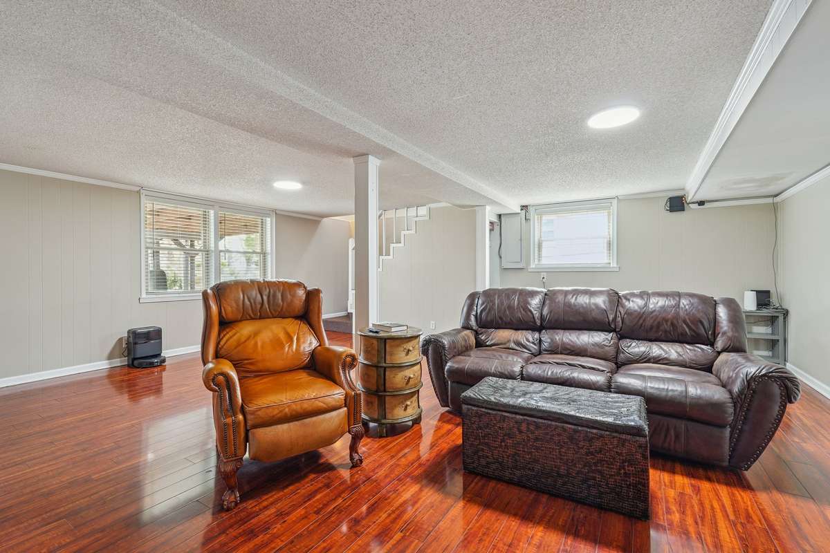 The room has windows and a private door to the exterior.