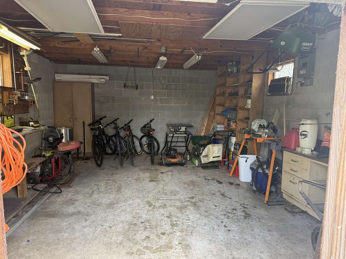 Lots of space in the shop and it has lights and concrete floor