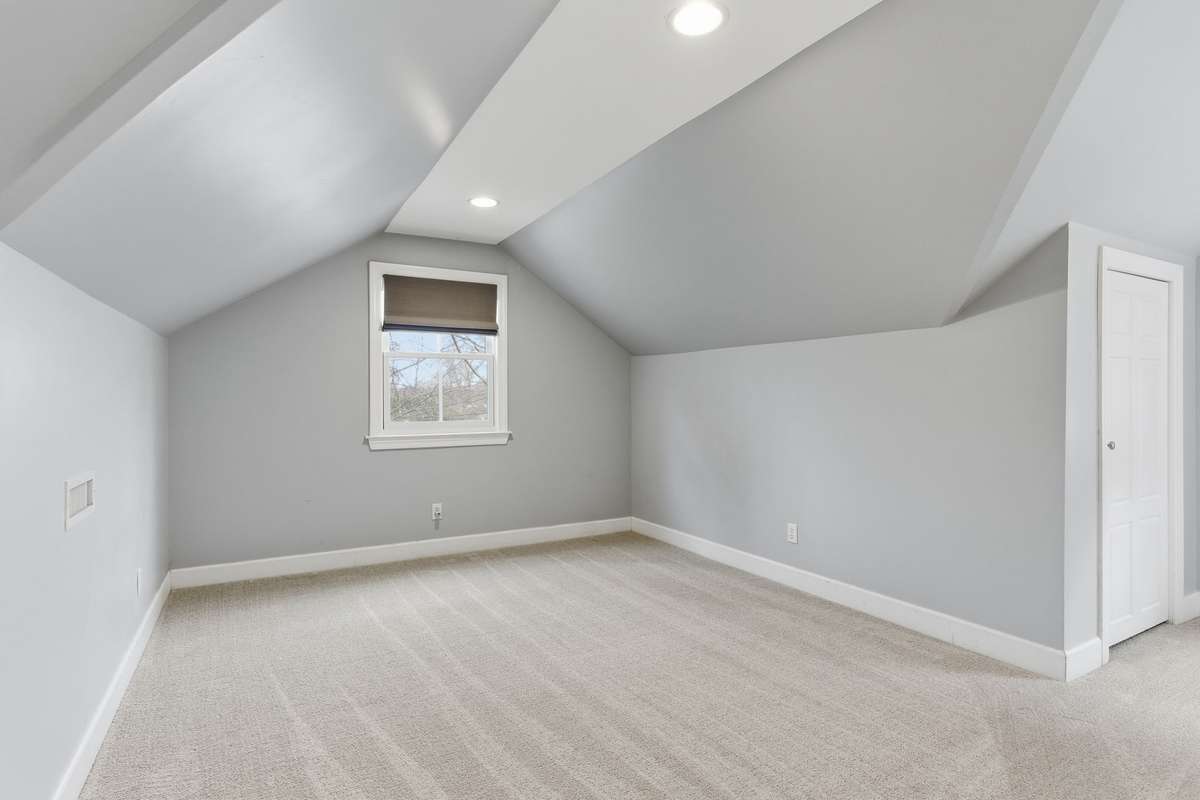 Spacious secondary bedrooms with walk-in closets.
