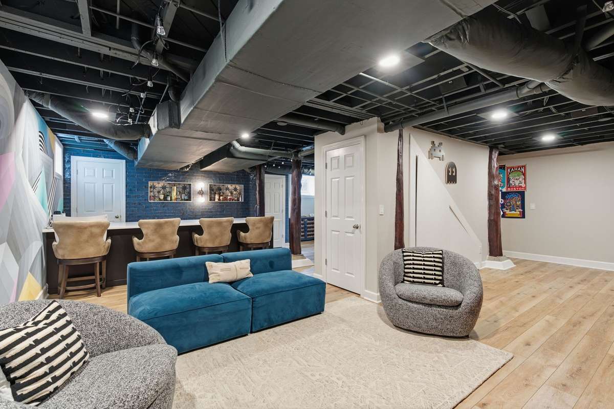Full basement with wet bar and half bath.
